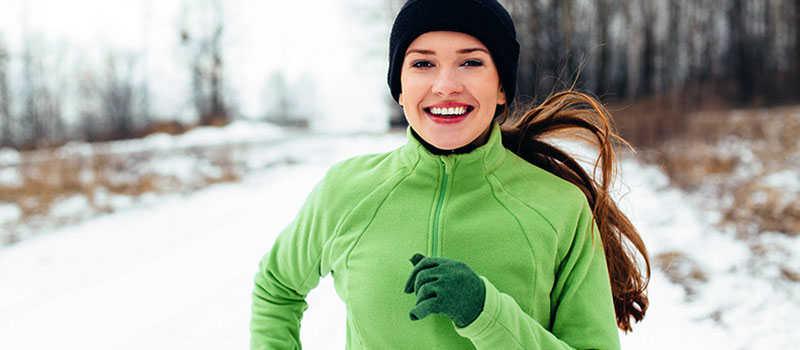 Girl running in the snow